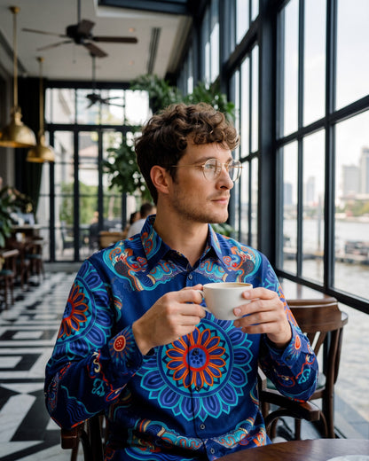Navy mulberry silk shirt Dragon of Grace, seated at a riverside brasserie